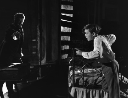 Tenor Peter Pearsas Quint and child soprano David Hemmings (1941 - 2003) as Miles in the English Opera Group's production of Benjamin Britten's 'The Turn Of The Screw', 13th October 1954. (Photo by Denis De Marney