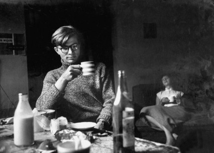 Colin Wilson drinking wine in a cup with girlfriend Joy