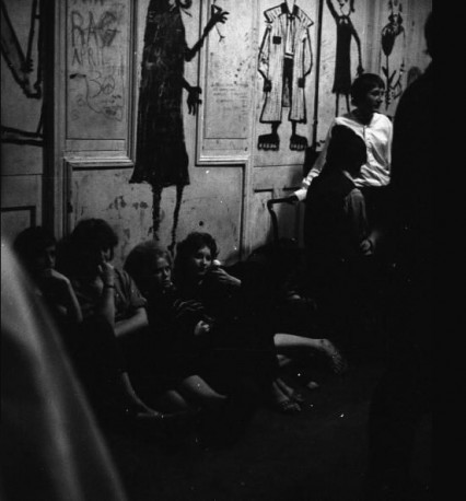 The wall decoration is described as 'beatnik graffiti'.