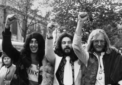 The wig-wearing Oz editors celebrating the outcome of the trial in November 1971