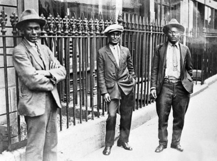 Three seamen on the West India Dock Road